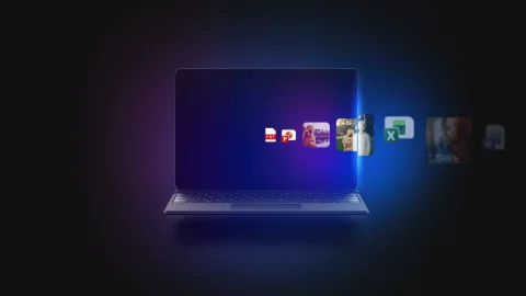 แล็ปท็อปเปิดหน้าจอ Windows 11 พร้อมไอคอนและภาพที่ไหลออกมาด้านข้าง
